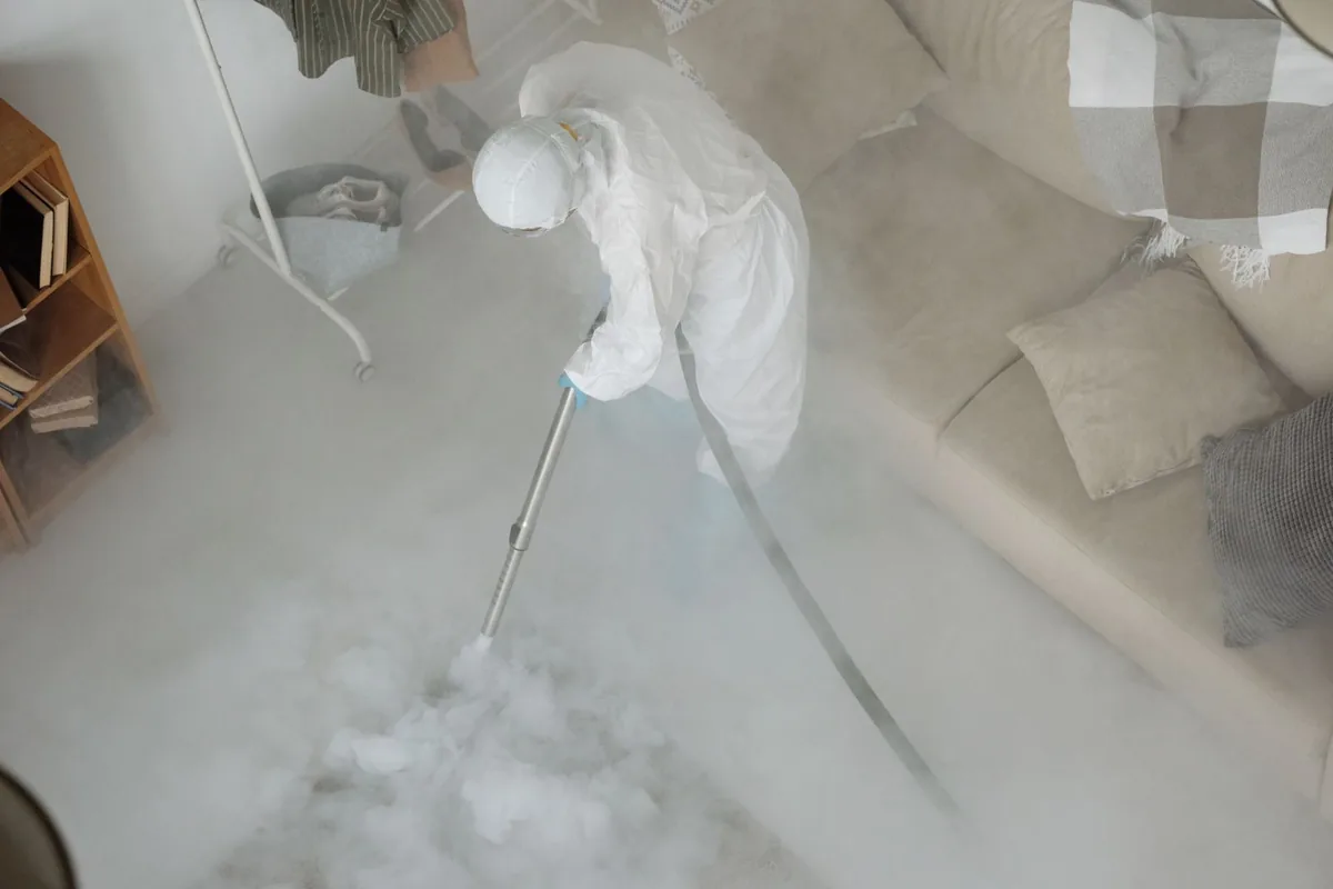 Biohazard cleanup technician in protective equipment, Marysville, WA